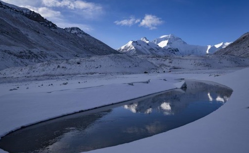 Crescent-shaped pool at foot of Mt Qomolangma