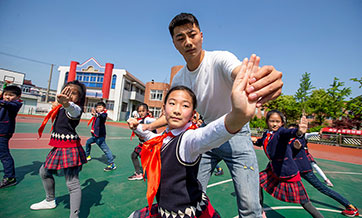 Chinese students can go mask-free on campuses in low-risk areas