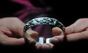 Miao silver forging skill taught in training institute in Hunan, C China