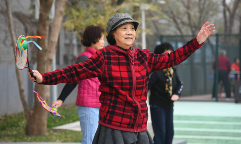 Masks outdoors no longer necessary in Beijing