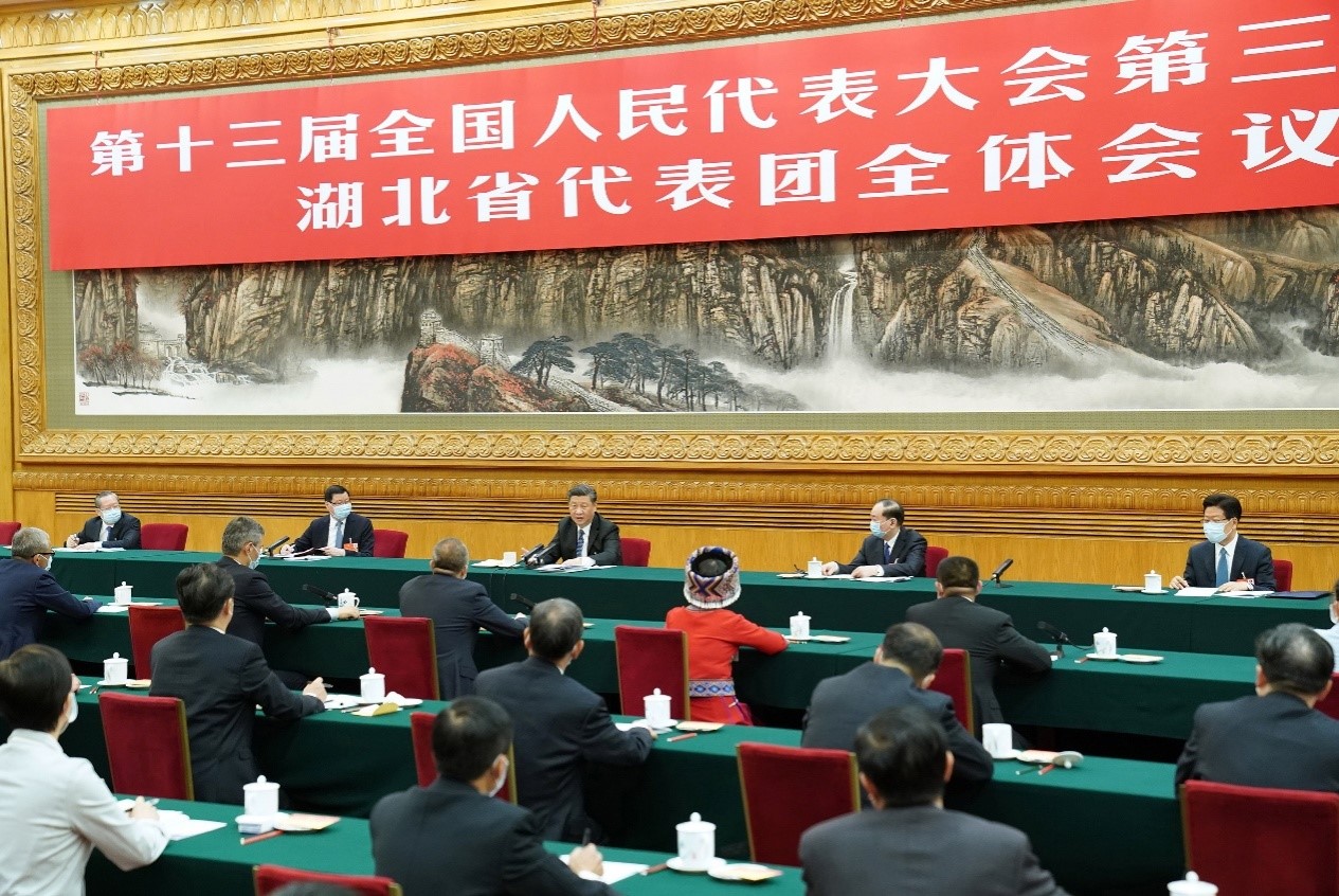 Chinese President Xi Jinping joins a deliberation with deputies from Hubei province at the third session of the 13th National People’s Congress in Beijing, on May 24, 2020. (Photo by Huang Jingwen/Xinhua News Agency)
