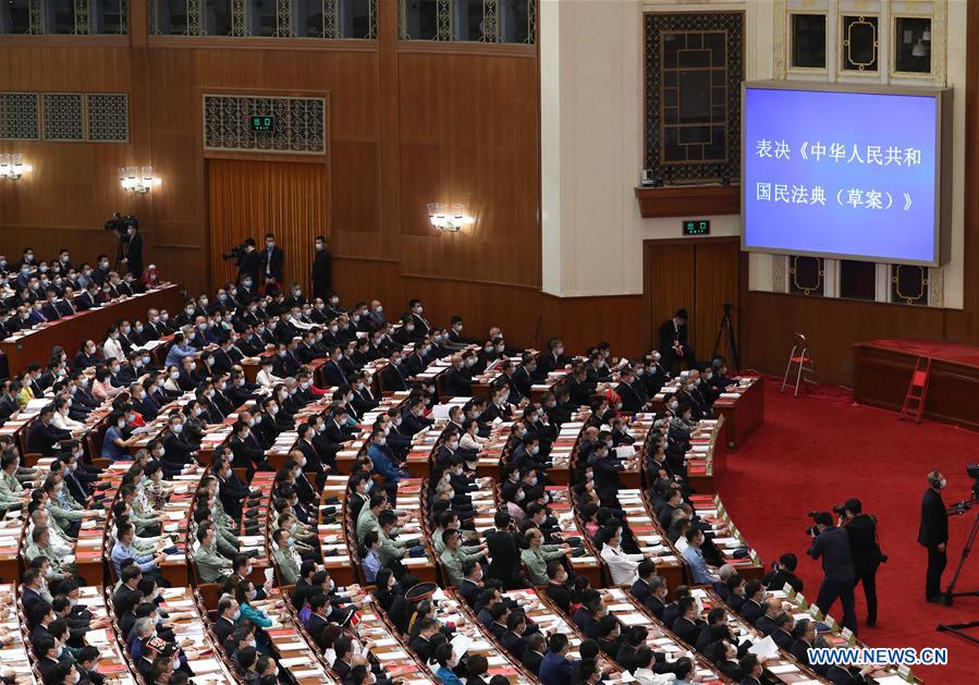China's top legislature holds closing meeting of annual session