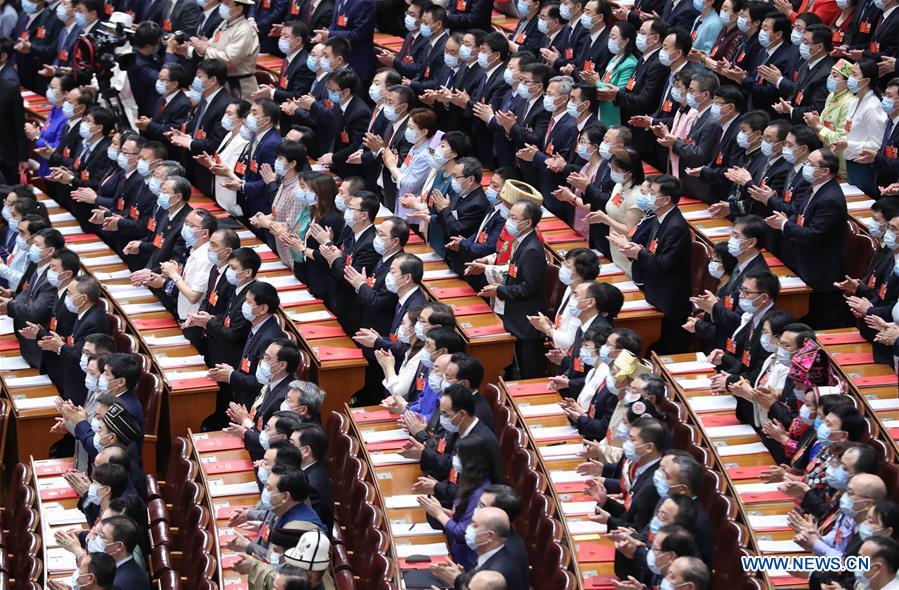 China's top legislature holds closing meeting of annual session