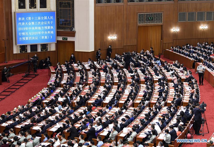 China's top legislature holds closing meeting of annual session
