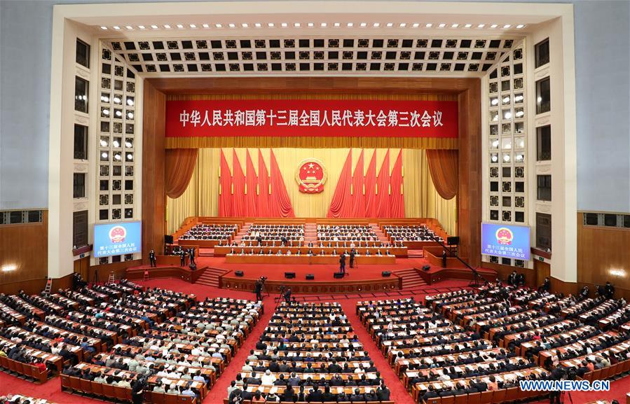 China's top legislature holds closing meeting of annual session