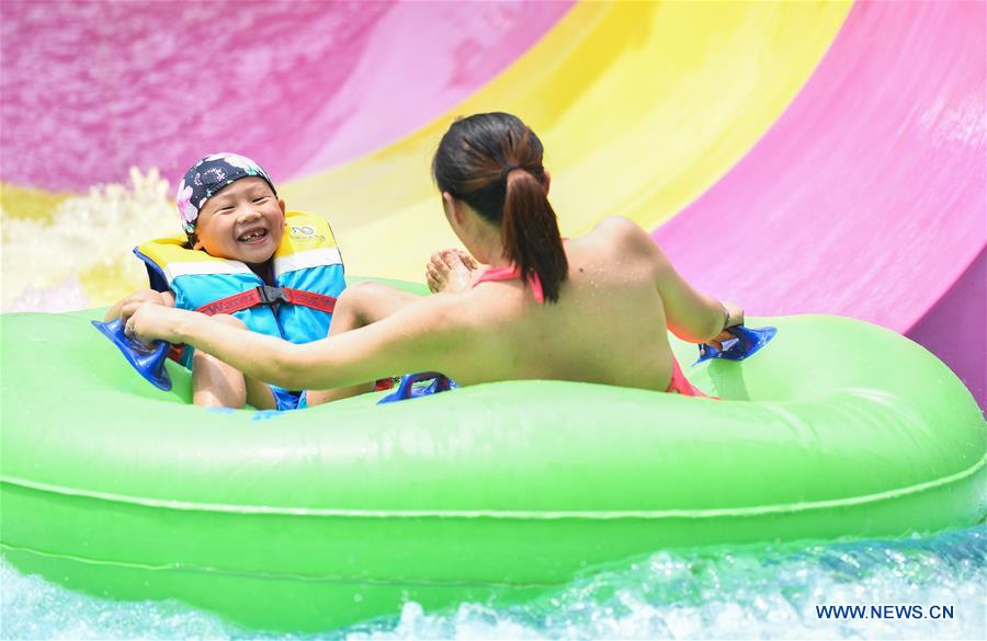 Guangzhou's Chimelong Water Park reopens with COVID-19 prevention measures