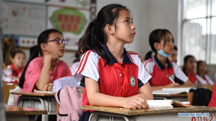 Guangxi makes efforts to improve education for poverty-stricken children