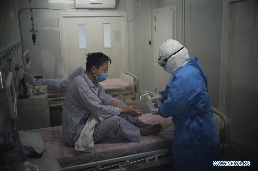 COVID-19 patients receive medical treatment in Beijing Ditan Hospital