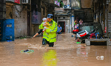 Chinese regions raise flood response levels