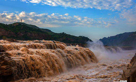 Yellow River's Hukou Waterfall returns to full force