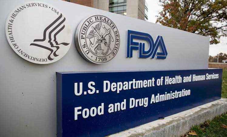 U.S. FDA chief declines to back Trump's "harmless" COVID-19 claim