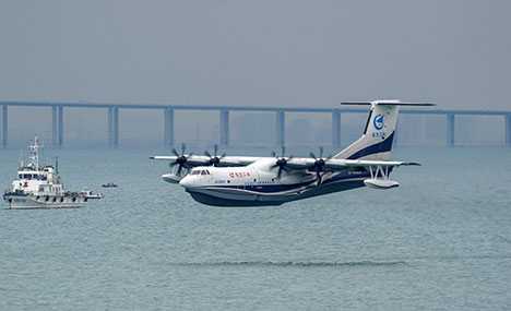 AG600 large amphibious aircraft completes maiden flight over sea