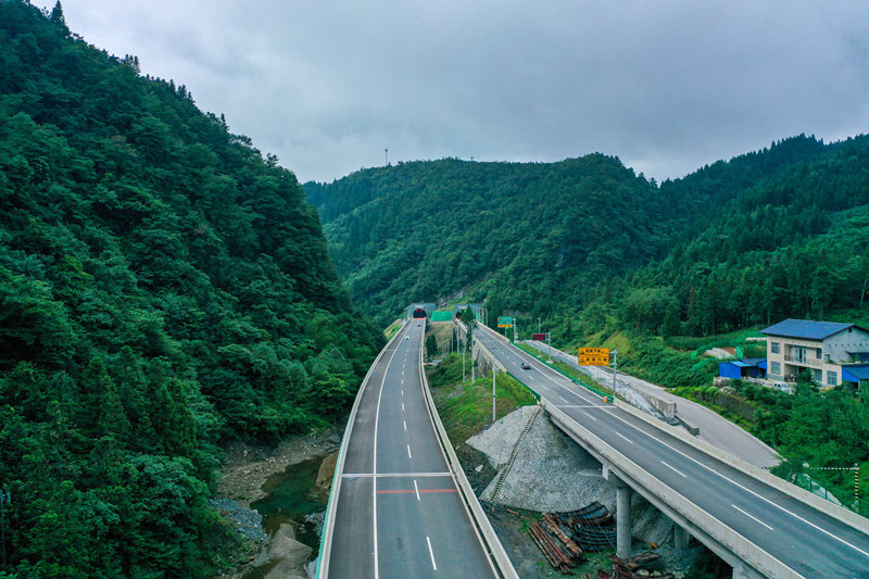 Winding mountain paths in central China's Hubei emerge as broad roads