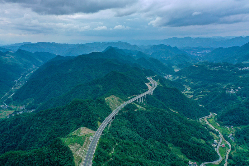 Winding mountain paths in central China's Hubei emerge as broad roads