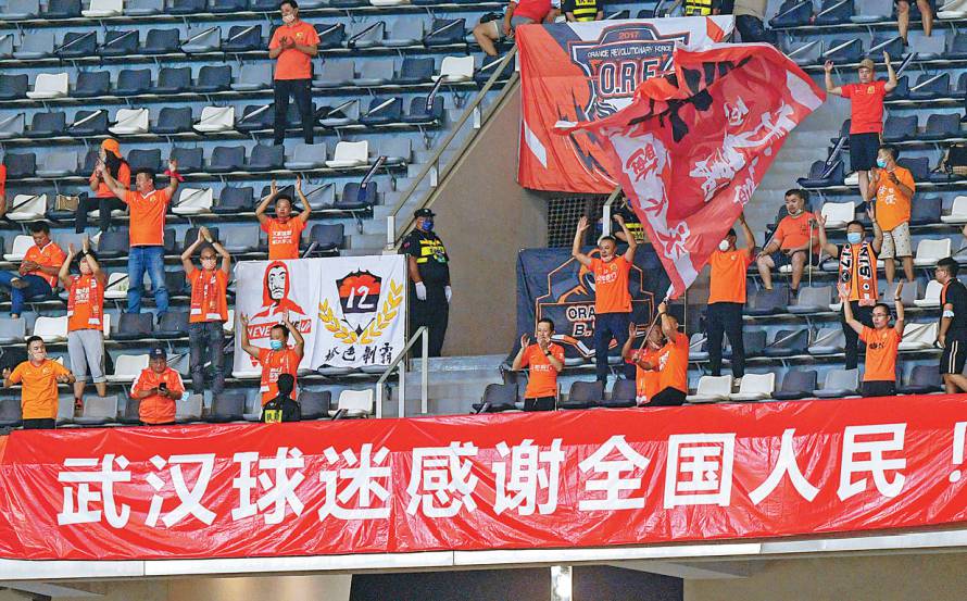 Roar emotion as Wuhan fans return to the stands
