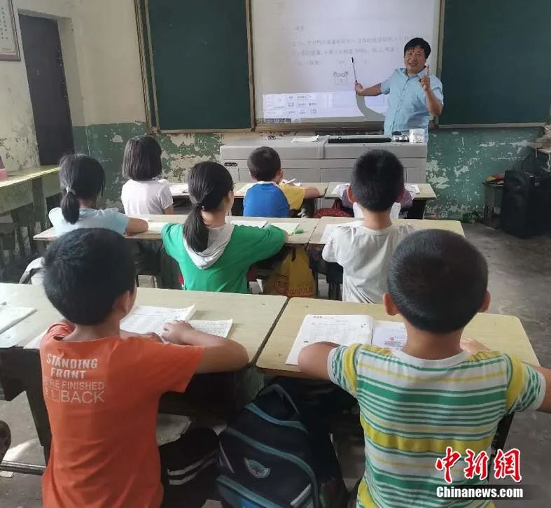 Devoted Chinese village teachers double up as parents for students