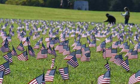 Flags cover the National Mall to memorialize COVID-19 deaths
