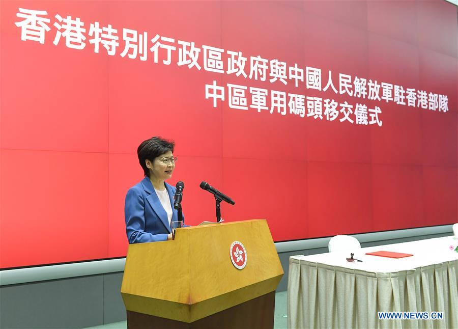 Chief Executive of the Hong Kong Special Administrative Region (HKSAR) Carrie Lam delivers a speech during the handover ceremony of Central Military Dock in Hong Kong, south China, Sept. 29, 2020. The HKSAR government on Tuesday handed over the Central Military Dock to the Chinese People's Liberation Army (PLA) Garrison in the HKSAR. (Xinhua)