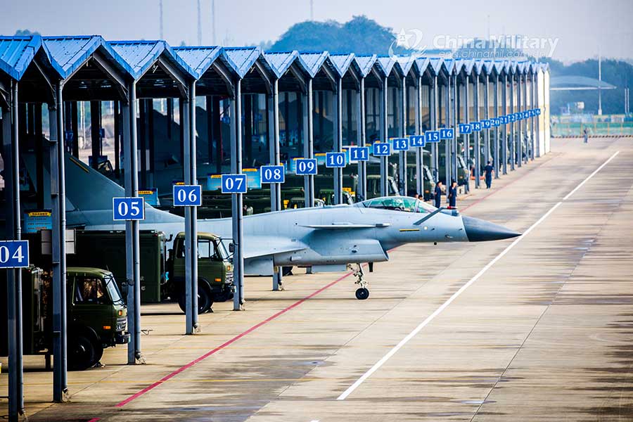 Fighter jets head for take-off on taxiway before flight