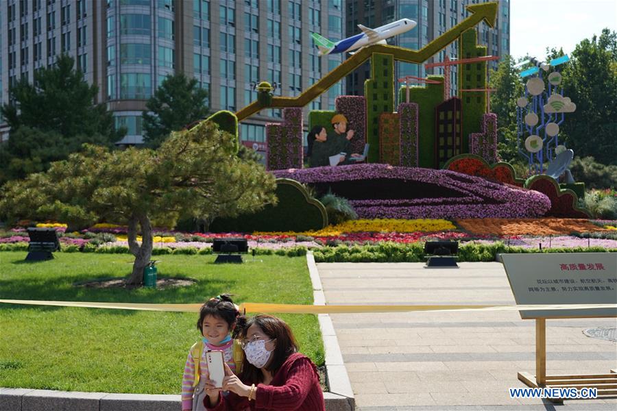 Flower decorations set up along Chang'an Avenue to celebrate Chinese National Day