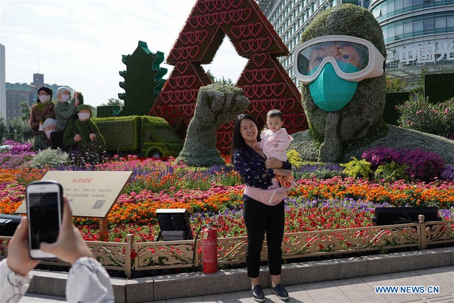 Flower decorations set up along Chang'an Avenue to celebrate Chinese National Day