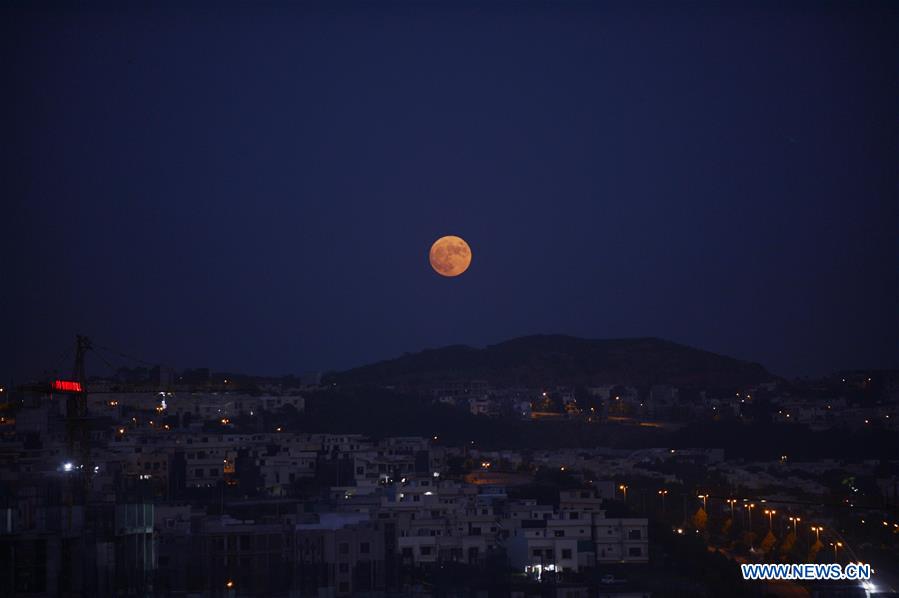 In pics: full moon seen across world
