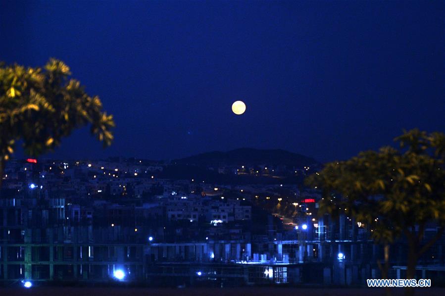 In pics: full moon seen across world