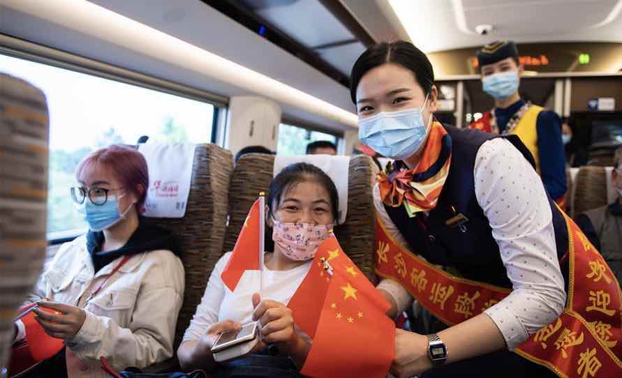 National Day, Mid-Autumn Festival celebrated on Fuxing bullet train