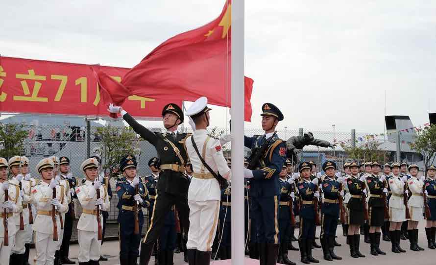 Hong Kong raises flags to celebrate National Day