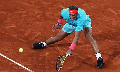 Nadal beats Djokovic in straight sets to win 13th French Open title