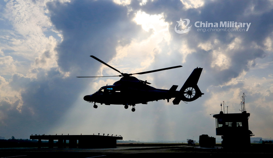 Helicopters patrol over mountainous region