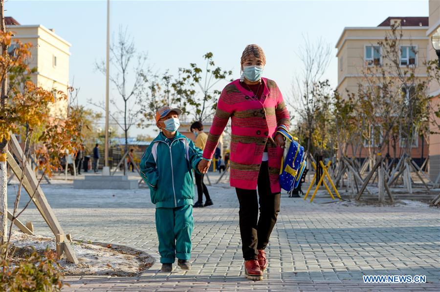 Construction work of 20 residential buildings completed in Axili, Xinjiang