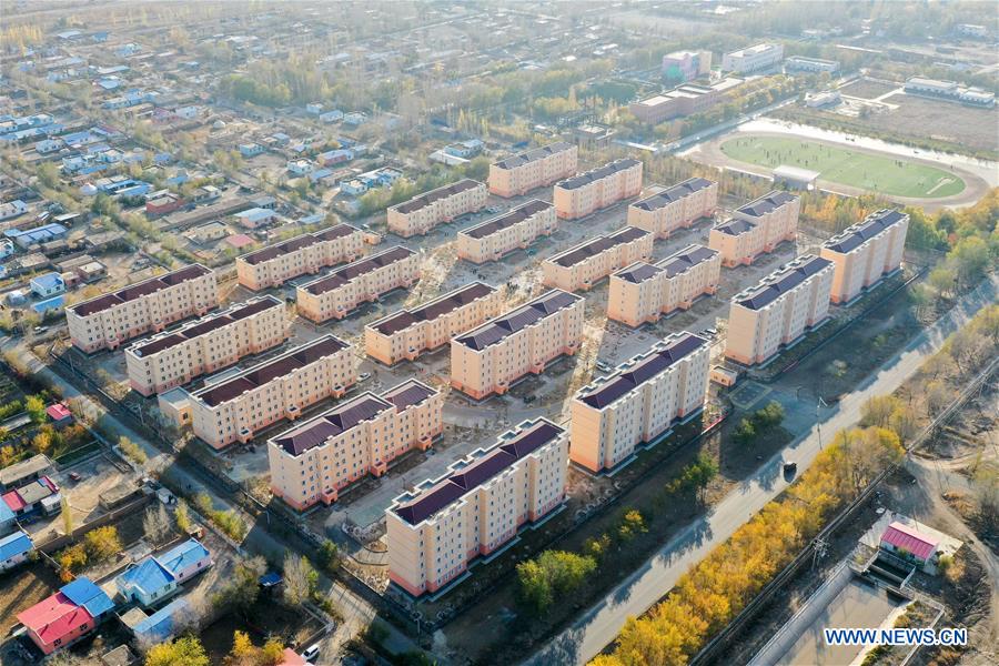 Construction work of 20 residential buildings completed in Axili, Xinjiang