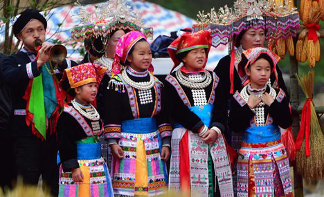 People of Yao ethnic group perform during harvest festival 