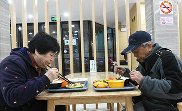 Cafeterias for the elderly in China's communities meet the need for a warm balanced meal 
