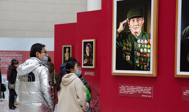 People visit exhibition at military museum in Beijing