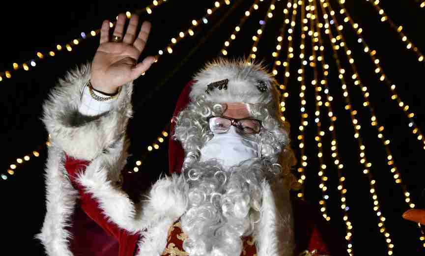 Men dressed in Santa Claus costume send greetings to citizens in Malta
