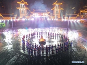 People dance to greet advent of New Year in Ameiqituo Town, Guizhou