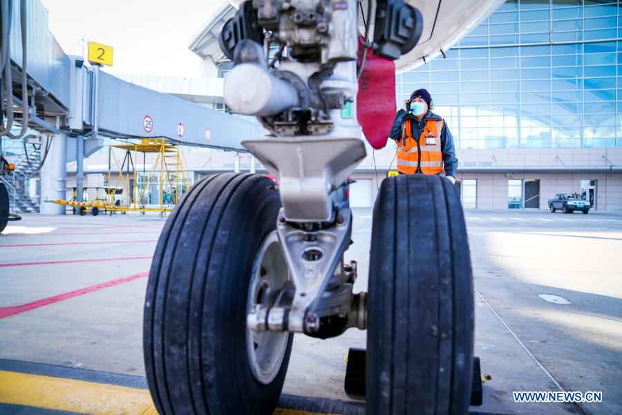 Aircraft maintenance engineers work hard to ensure smooth and safe operation of airport in Daqing