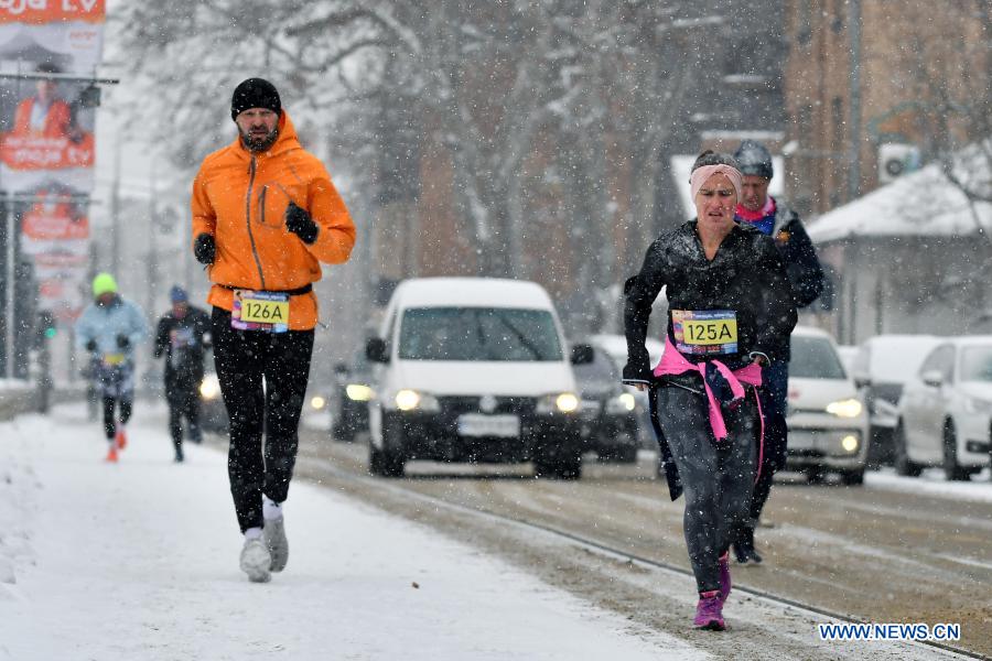 Contestants take part in marathon race in Sarajevo