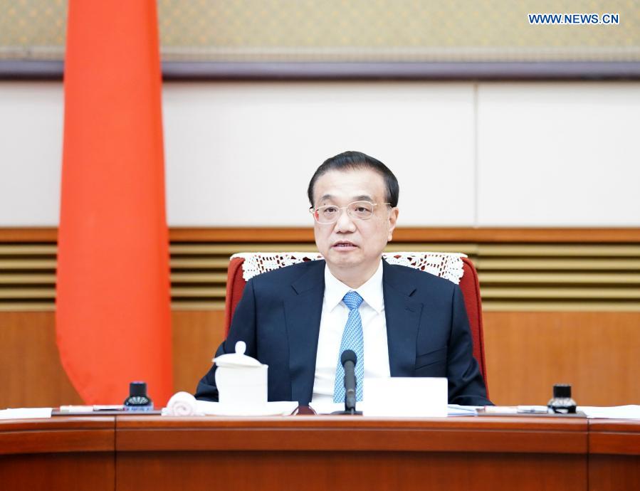 China's cabinet discusses draft gov't work report, 14th Five-Year Plan
