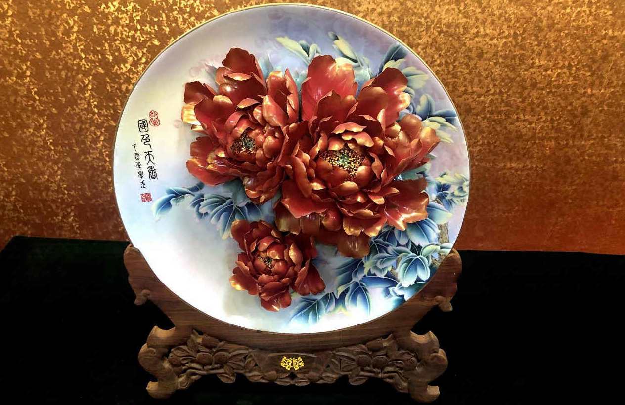 Everlasting beauty of the peony: peony porcelain master breathes new life in traditional culture 