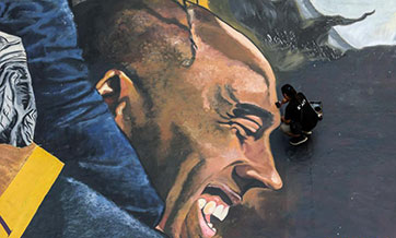 Artists paint giant mural to honor Kobe Bryant and Gianna in Manila