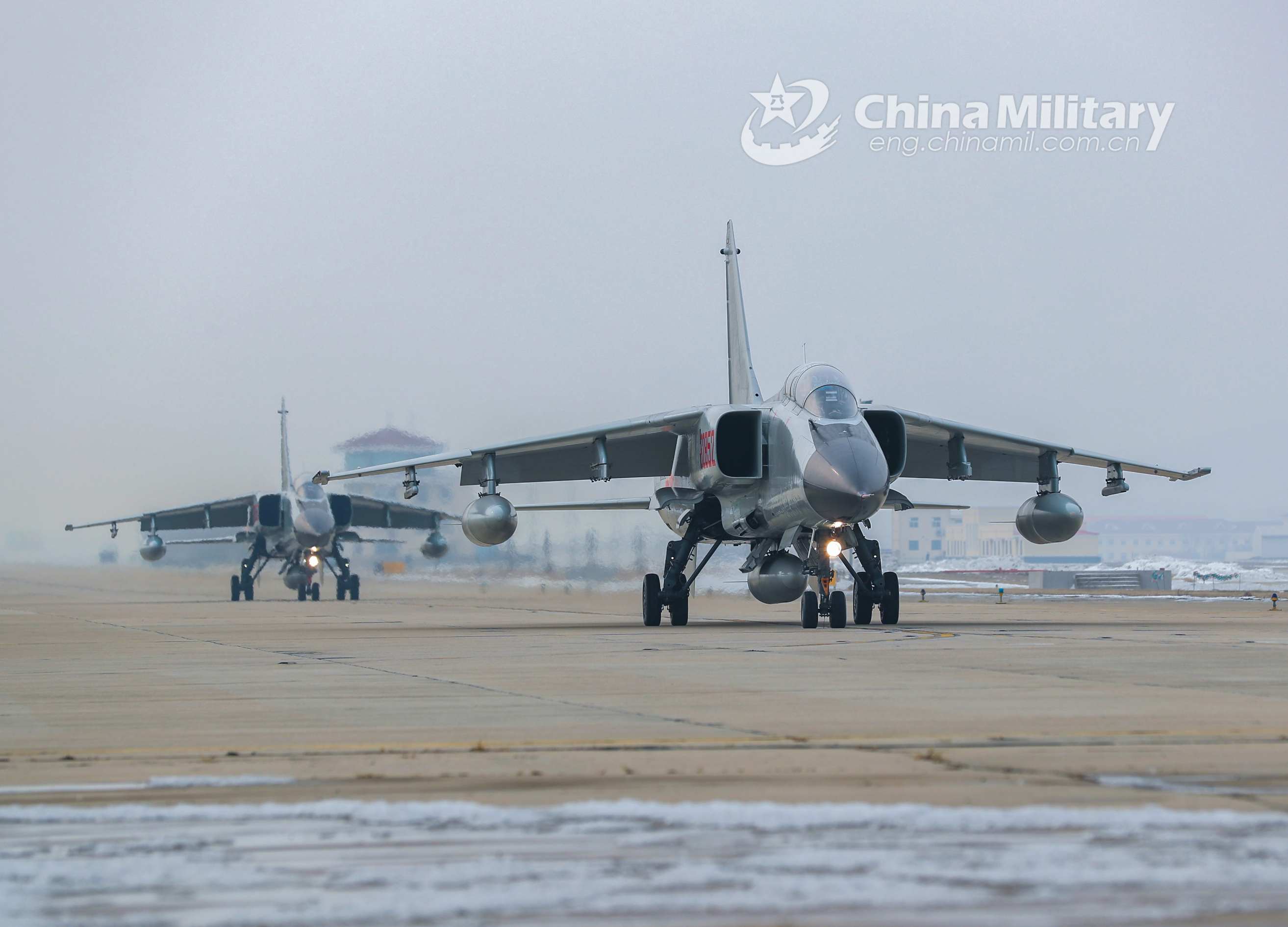 A JH-7 fighter bomber attached to a naval aviation brigade under the PLA Northern Theater Command takes off during a flight training exercise in early January, 2021. (eng.chinamil.com.cn/Photo by Duan Yanbing)