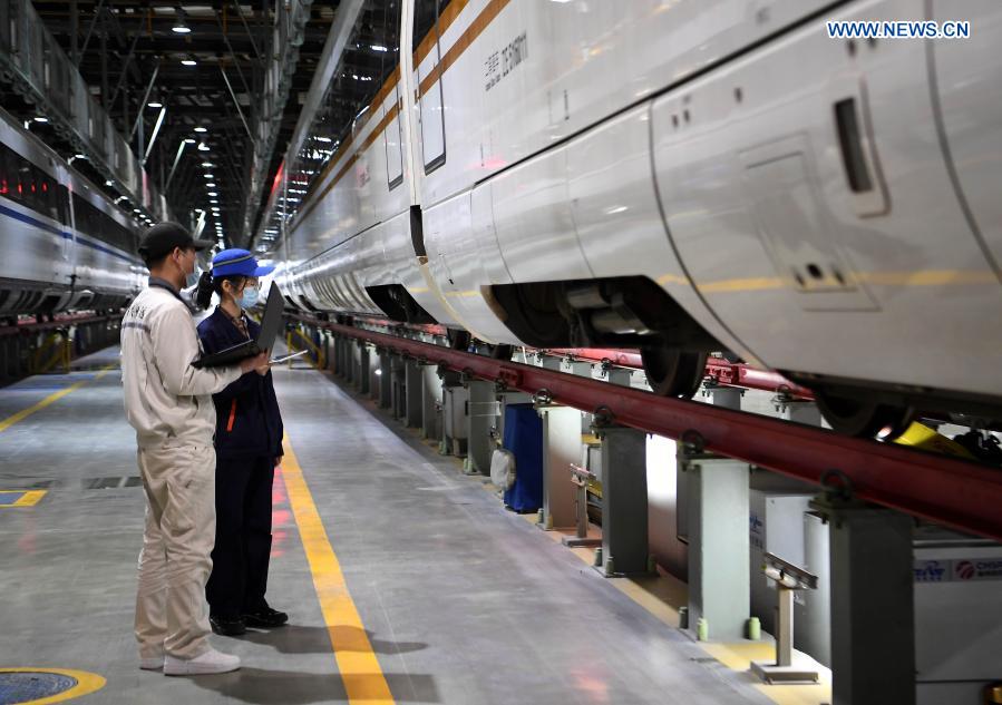 Workers carry out maintenance work, epidemic precaution for trains in preparation for Spring Festival travel rush