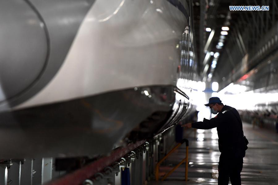 Workers carry out maintenance work, epidemic precaution for trains in preparation for Spring Festival travel rush