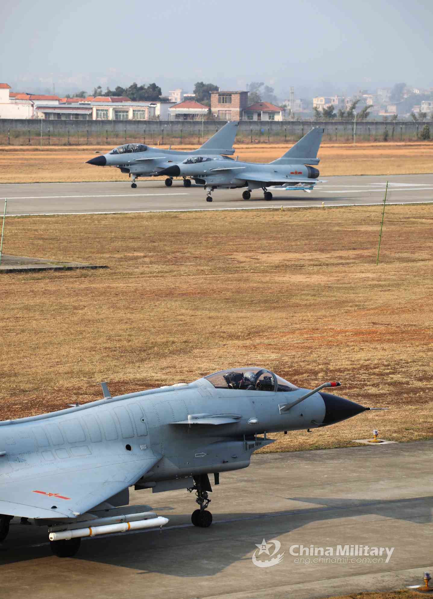 Fighter jets accelerate to take off