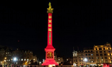 Nelson's Column, fountains illuminated in red to celebrate forthcoming Chinese Lunar New Year in London