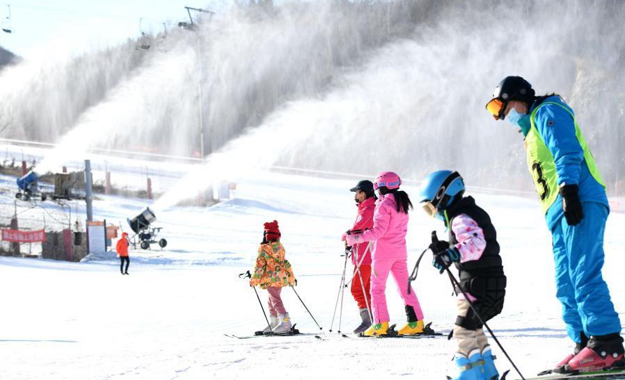People practice skiing at ski resort in Shijiazhuang, N China