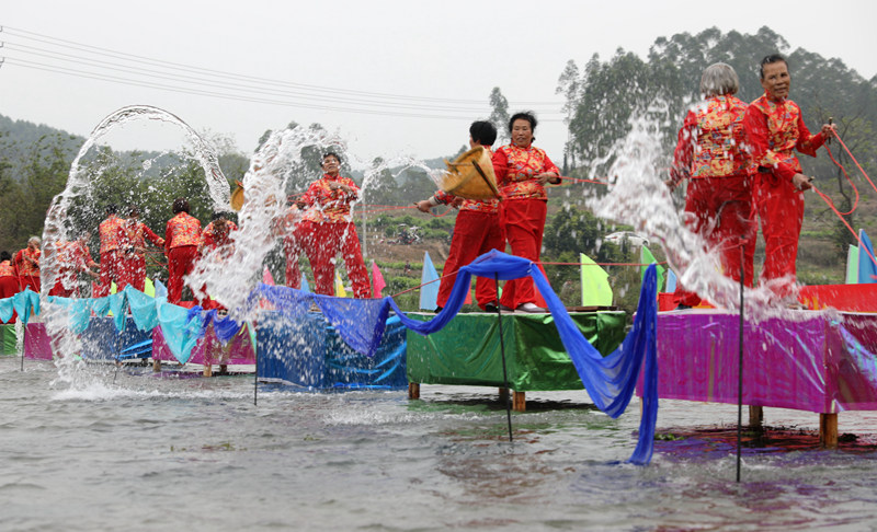 Residents in south China’s Guangxi stage folklore performances to pray for a bumper harvest